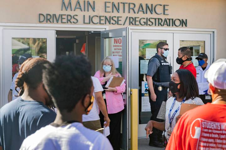 Instructions are given to individuals without appointments at the Nevada Department of Motor Ve ...