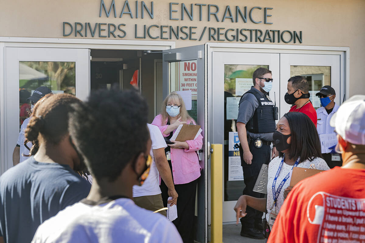 Instructions are given to individuals without appointments at the Nevada Department of Motor Ve ...