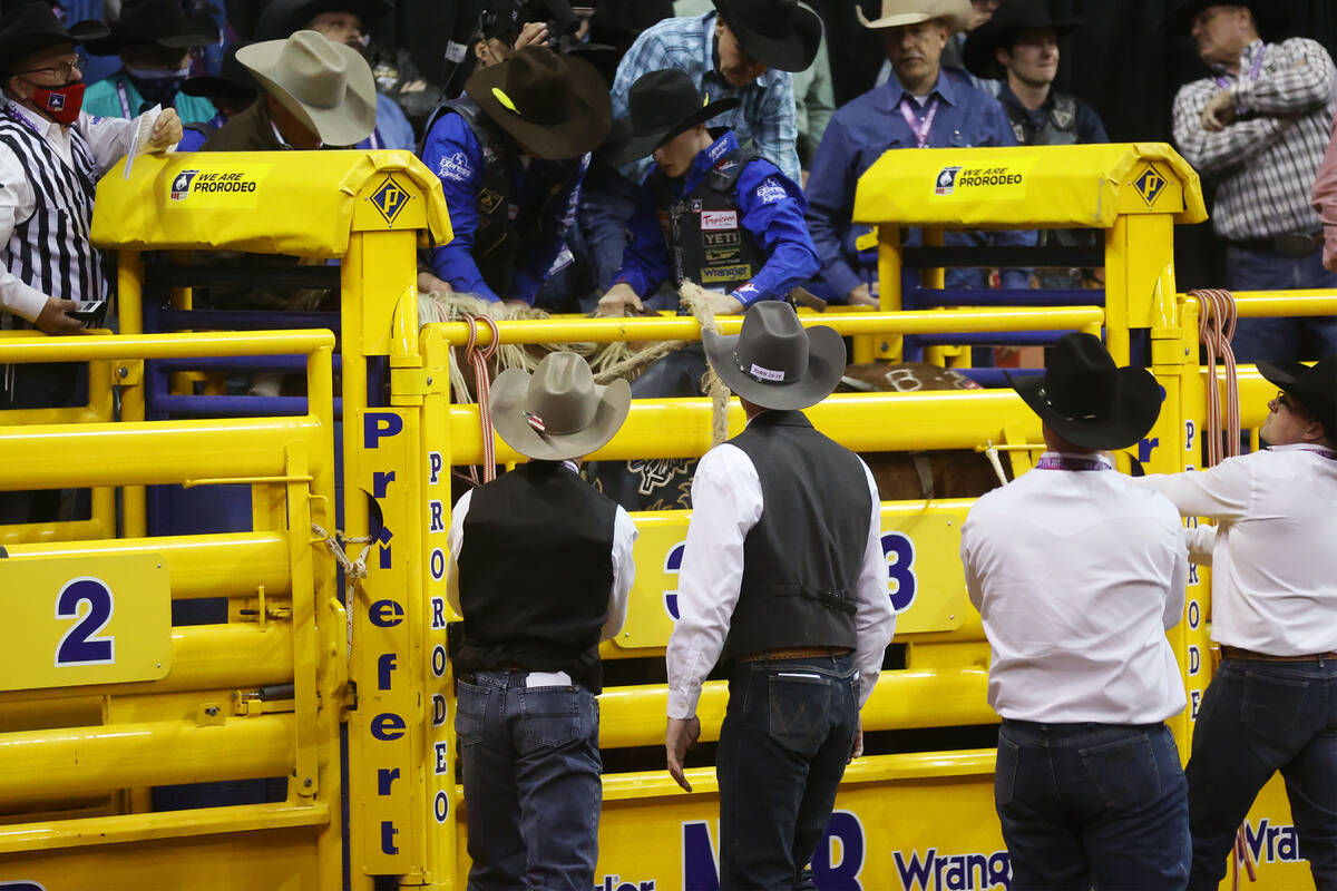 Stetson Wright of Milford, Utah, gets ready to compete in the saddle bronc riding event during ...