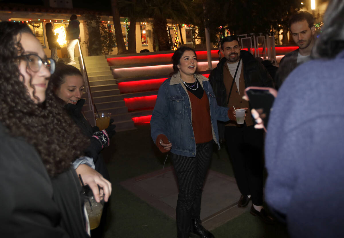 TikTok star Marissa Meizz, center, talks with attendees during the AfterParty at Fergusons Down ...