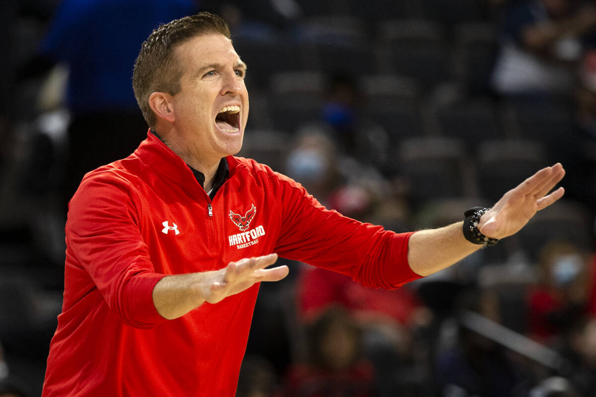 Hartford Hawks head coach John Gallagher shouts from the sidelines during the first half of an ...