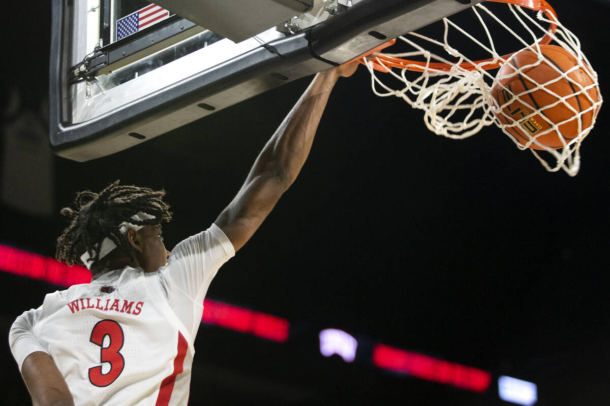 UNLV Rebels forward Donovan Williams (3) dunks during the first half of an NCAA mens college ba ...