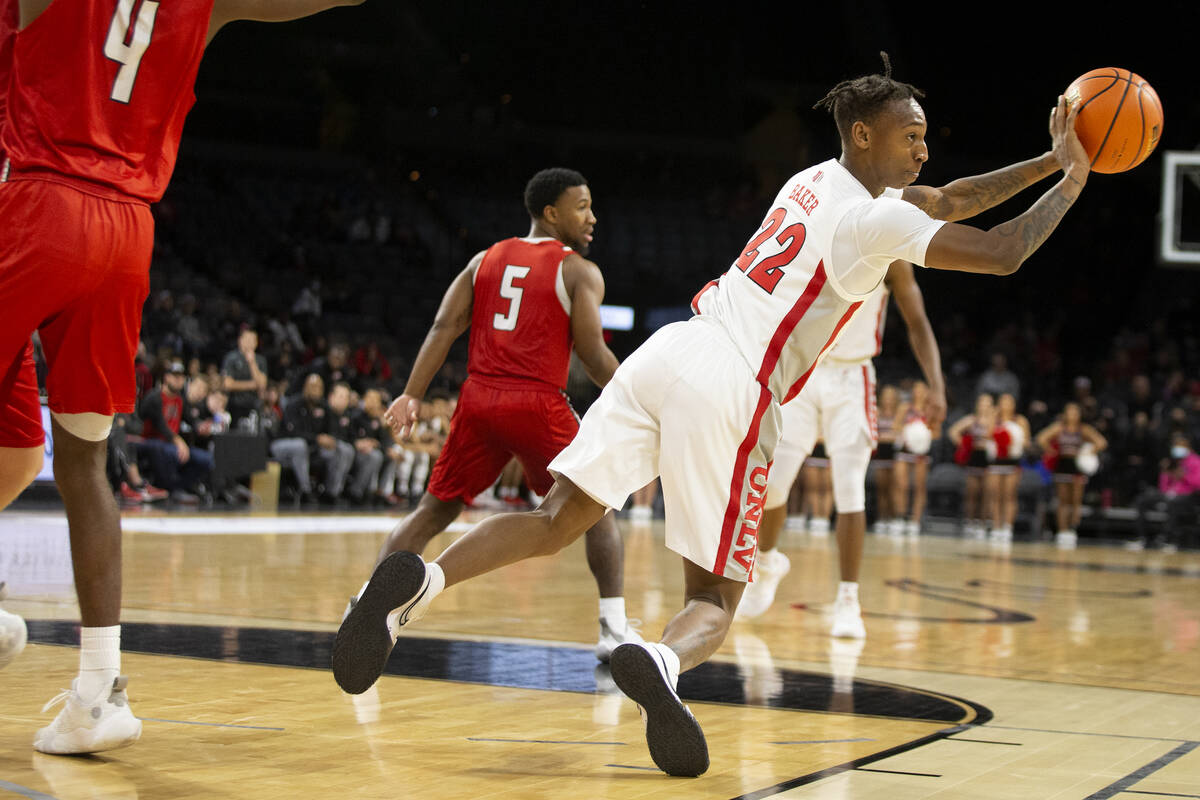 UNLV Rebels guard Josh Baker (22) passes as the team moves up the court during the first half o ...