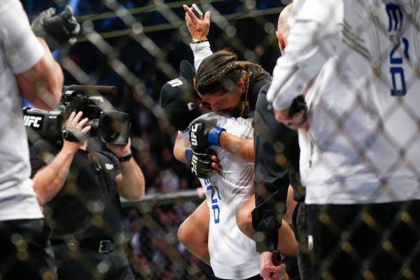 Julianna Pena celebrayes after defeating Amanda Nunes by submission in a women's bantamweight m ...