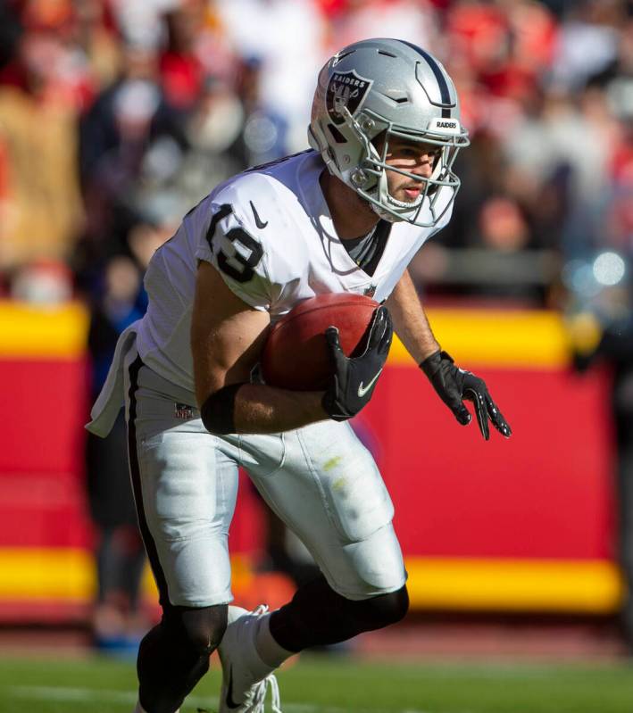 Raiders wide receiver Hunter Renfrow (13) runs with the football on a punt return during the fi ...