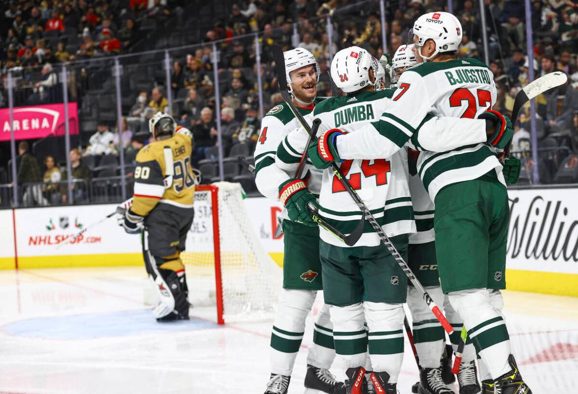 The Minnesota Wild celebrate after a goal against the Golden Knights during the second period o ...