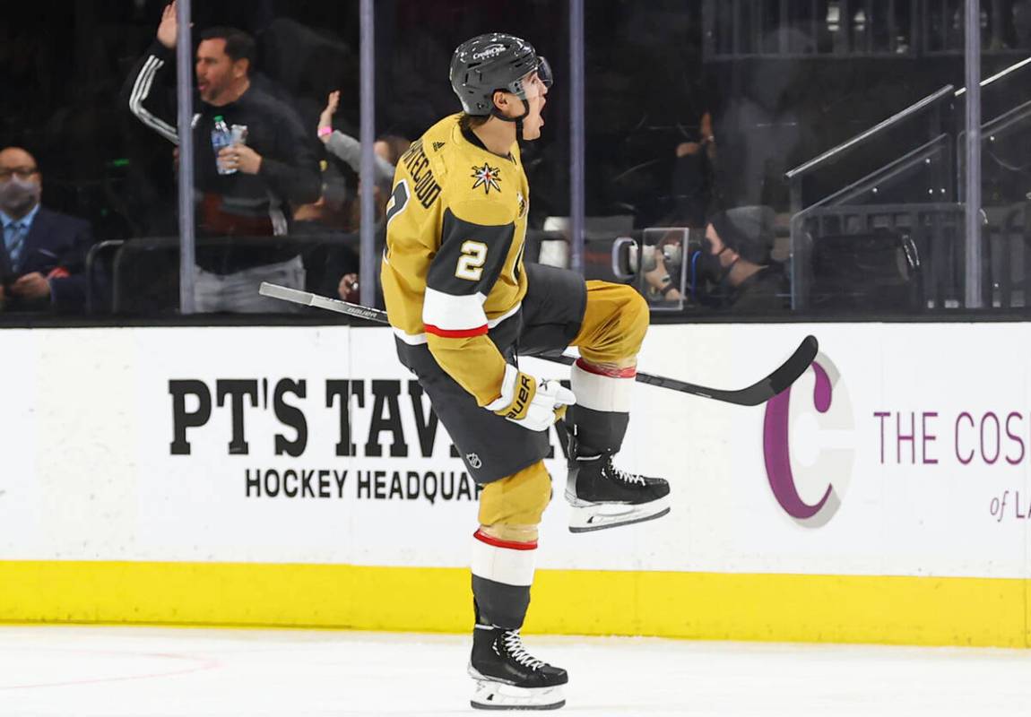 Golden Knights defenseman Zach Whitecloud (2) celebrates after his goal against the Minnesota W ...