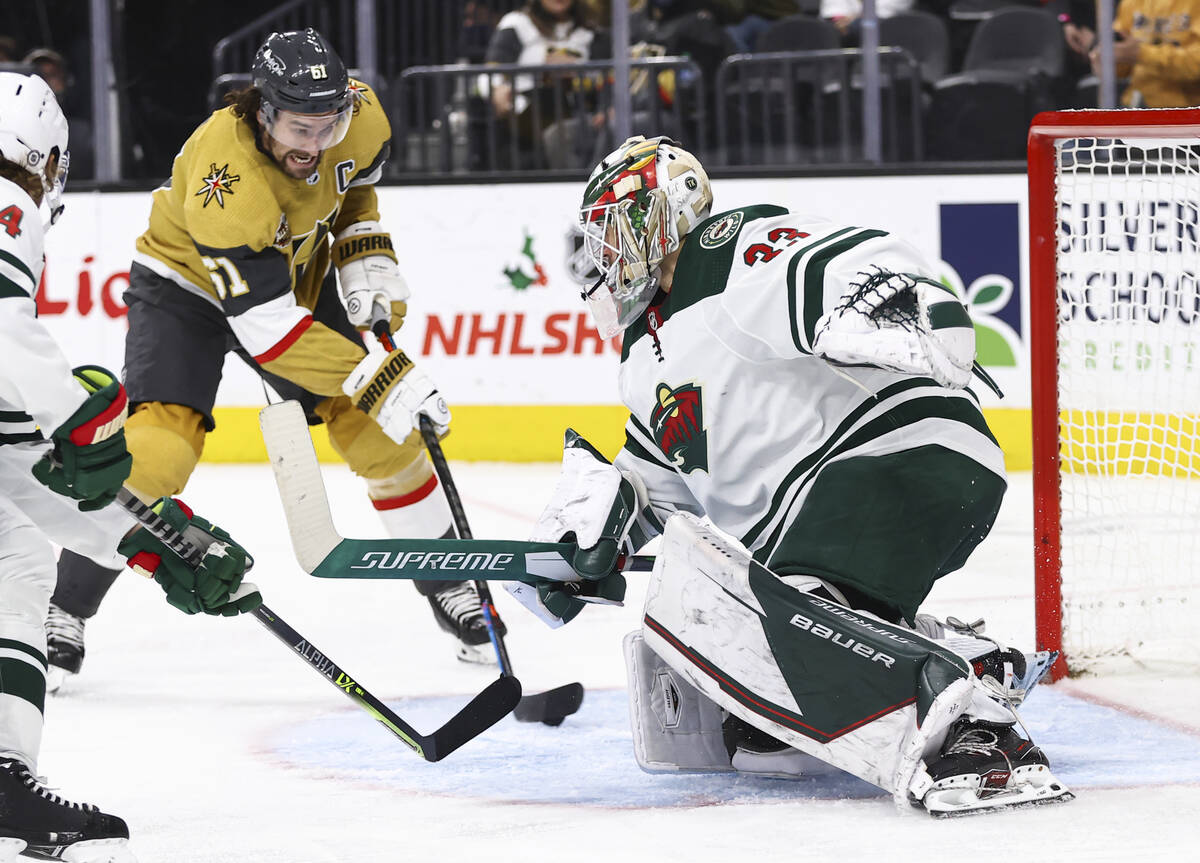 Golden Knights right wing Mark Stone (61) lines up the puck to score a goal past Minnesota Wild ...