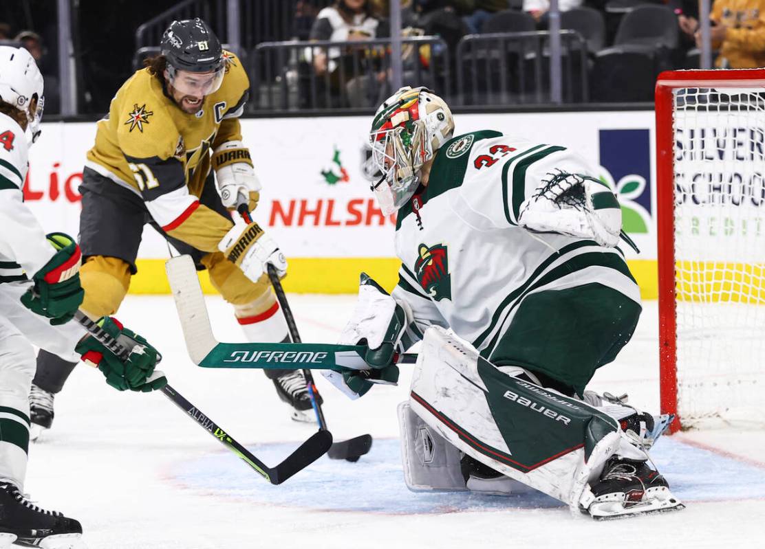 Golden Knights right wing Mark Stone (61) lines up the puck to score a goal past Minnesota Wild ...