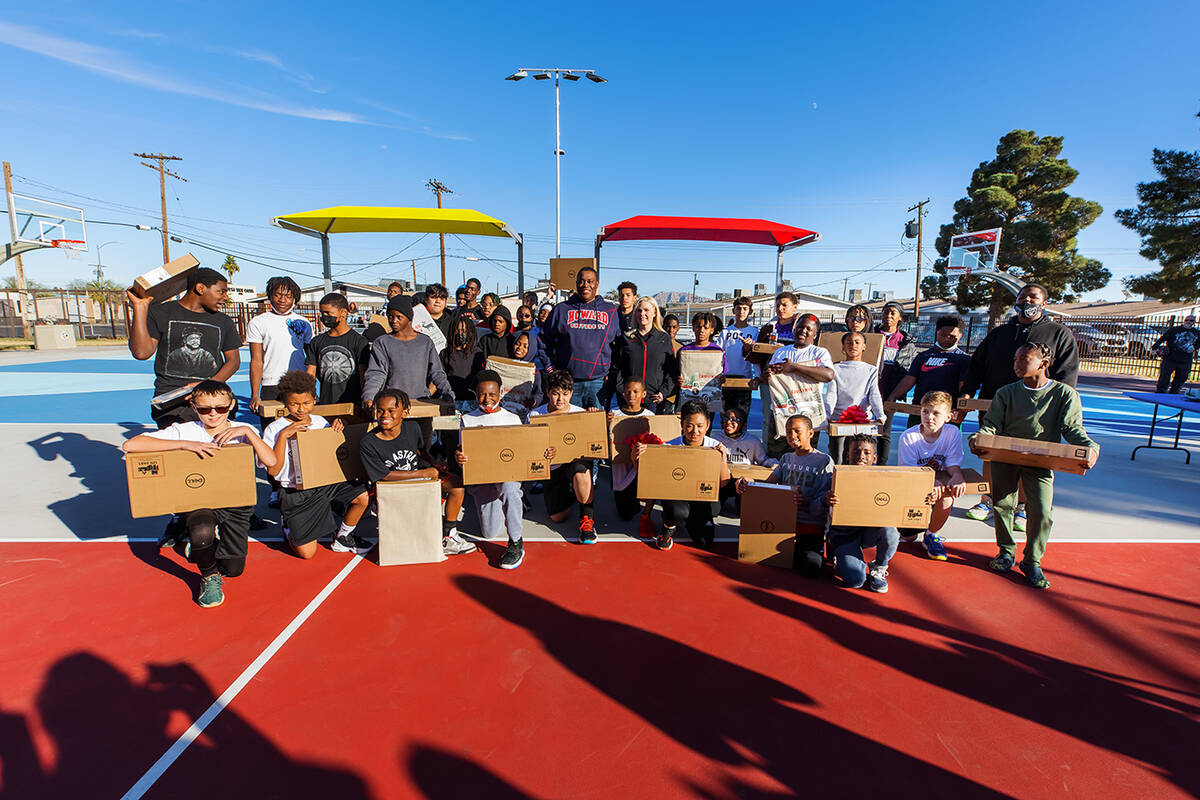 Local youths join Las Vegas City Councilman Cedric Crear and Danielle Bisterfeldt to celebrate ...