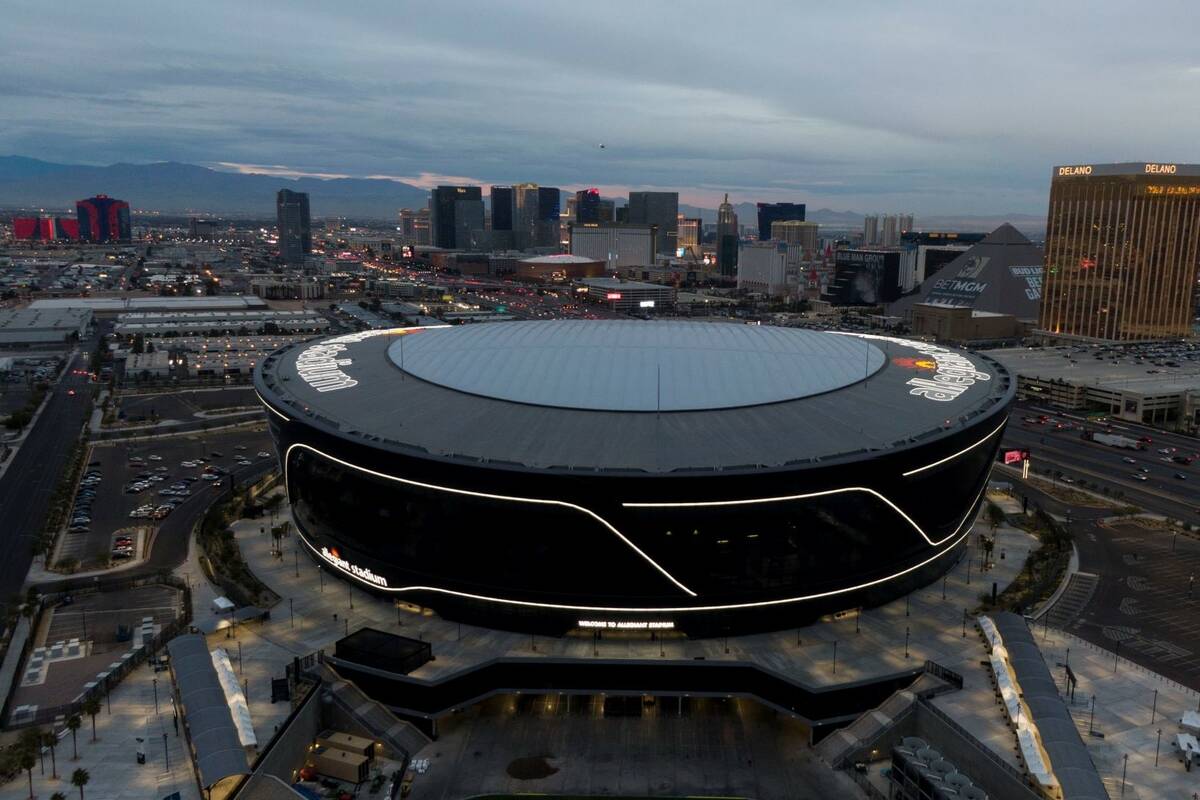 Aerial view of Allegiant Stadium and the Las Vegas Strip on Tuesday, December 7, 2021. (Michael ...