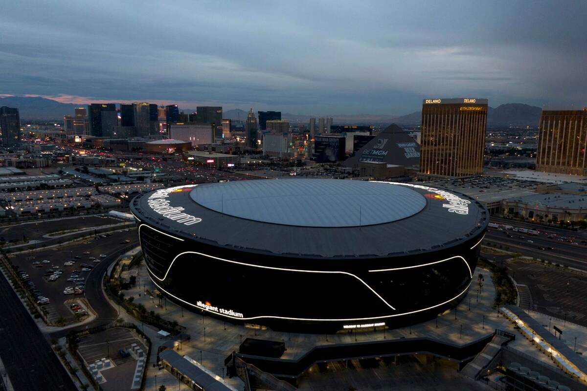 Aerial view of Allegiant Stadium and the Las Vegas Strip on Tuesday, December 7, 2021. (Michael ...