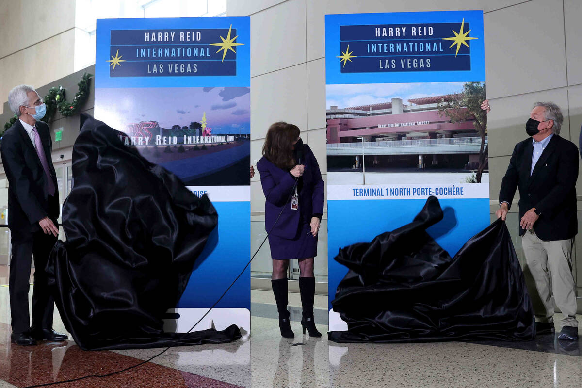 Rory Reid, son of Harry Reid, left, Clark County Director of Aviation Rosemary Vassiliadis and ...