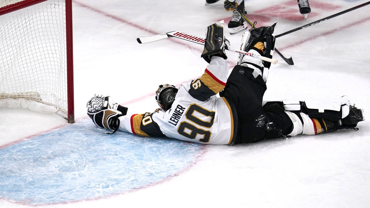Vegas Golden Knights goaltender Robin Lehner (90) slides out of the crease and makes a save dur ...