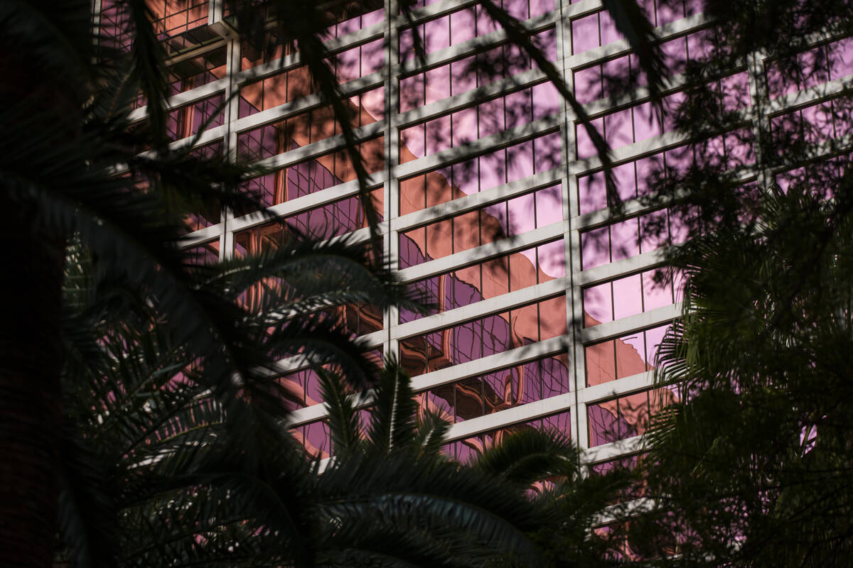Reflections in the windows of the Flamingo in Las Vegas on Wednesday, Dec. 8, 2021. (Chase Stev ...