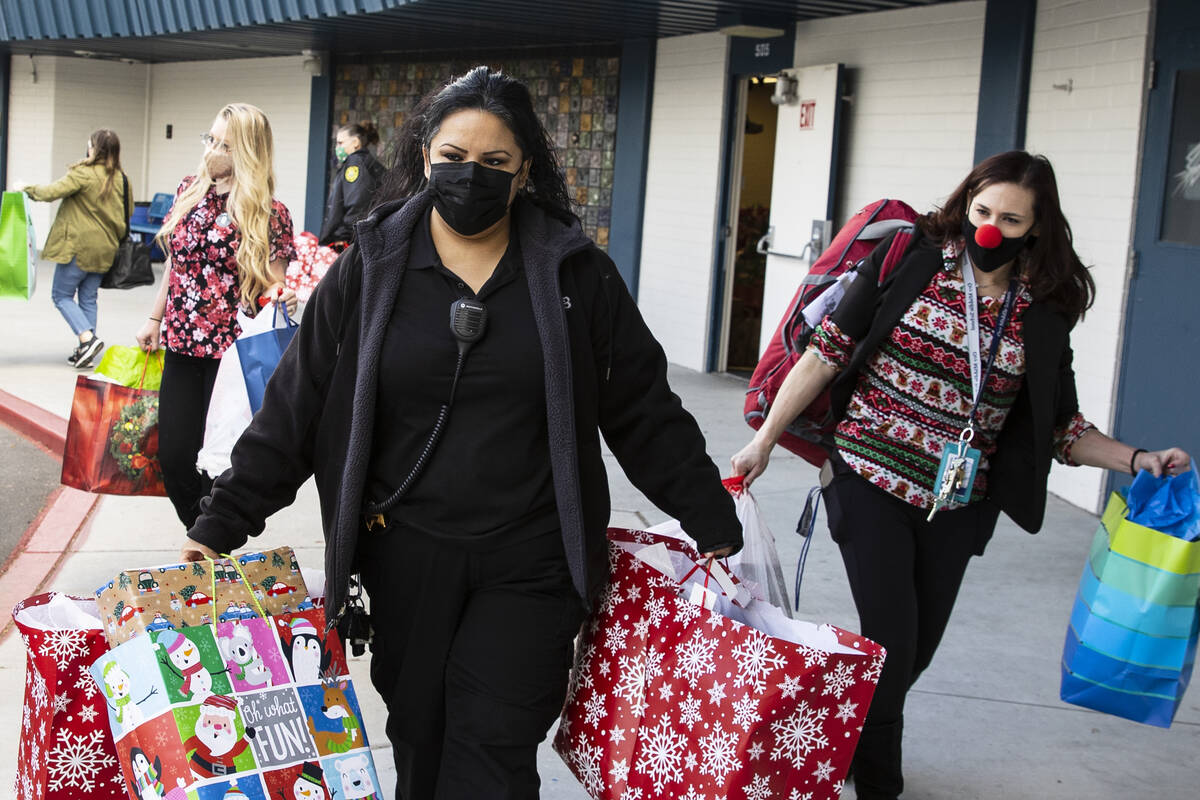 Alexia Guerrero, left, the Clark County attendance officer, and Melissa Jackson, an office mana ...