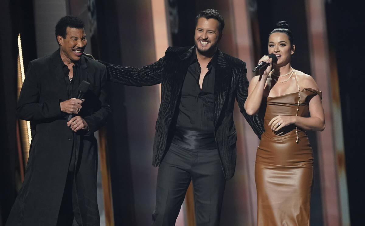 Lionel Richie, from left, Luke Bryan and Katy Perry appear on stage at the 55th annual CMA Awar ...
