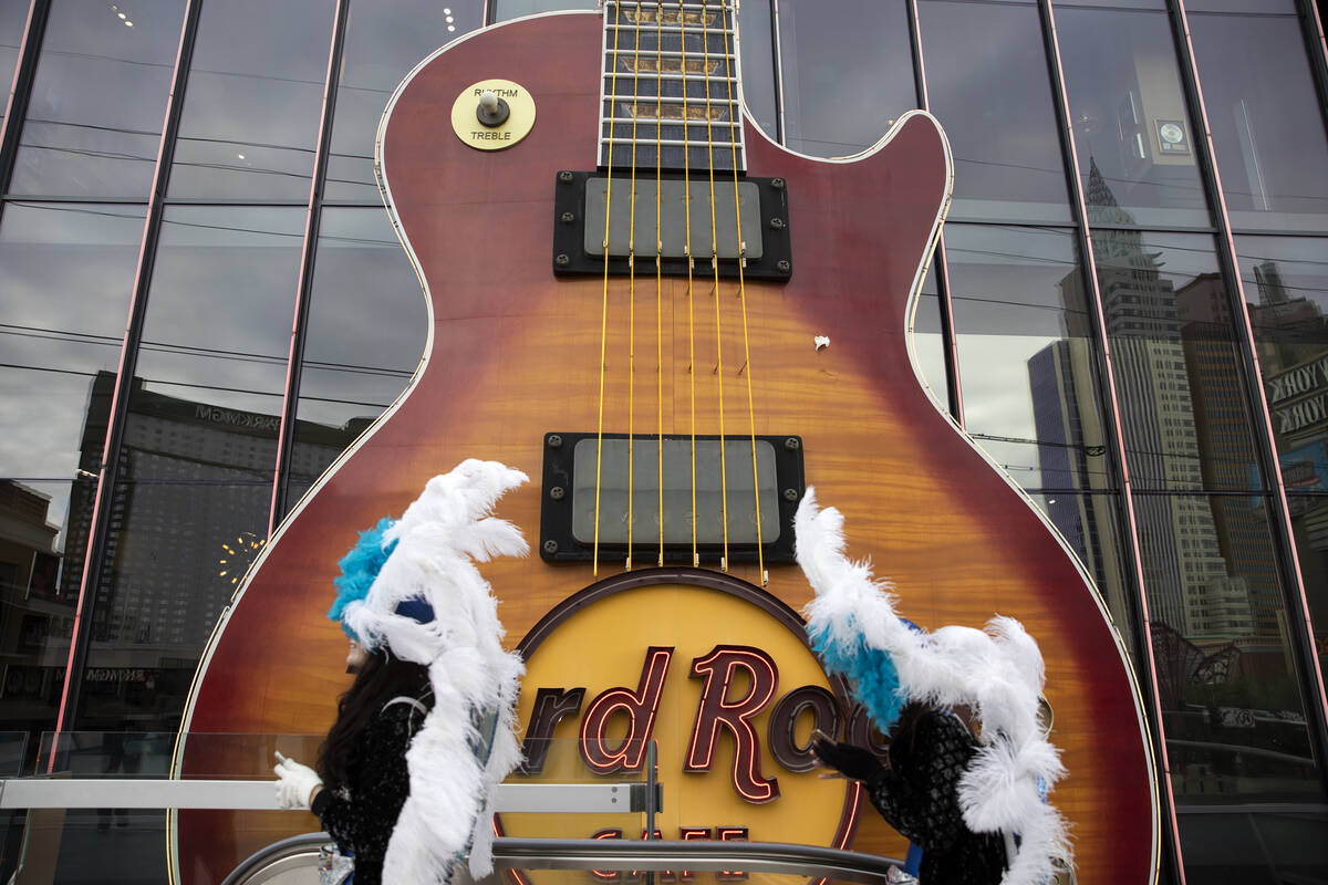 An enormous guitar adorns the outside of a Hard Rock Cafe on Thursday, Dec. 16, 2021, on the La ...