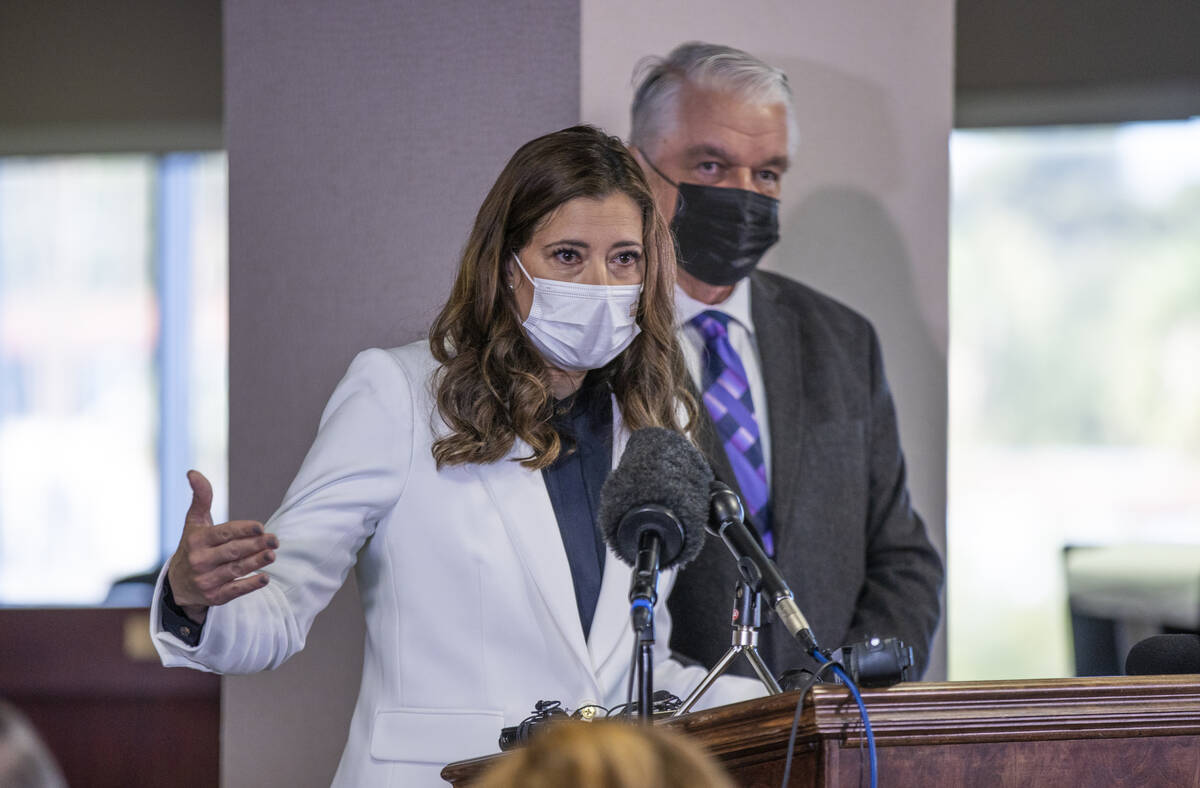 Newly appointed Nevada Lt. Gov. Lisa Cano Burkhead answers a question from the media beside Gov ...