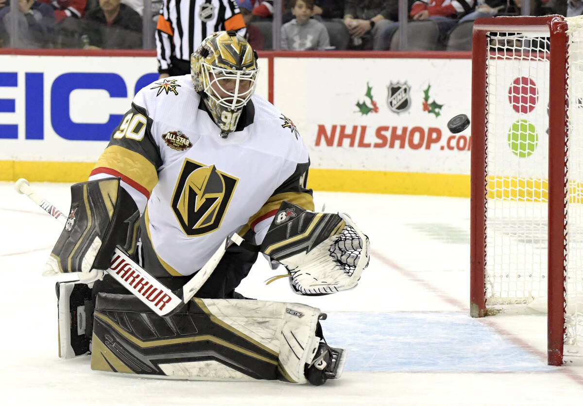Vegas Golden Knights goaltender Robin Lehner deflects the puck during the first period of an NH ...
