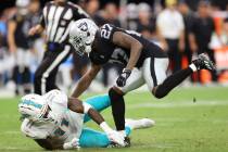 Las Vegas Raiders cornerback Trayvon Mullen (27) defends a pass intended for Miami Dolphins wid ...