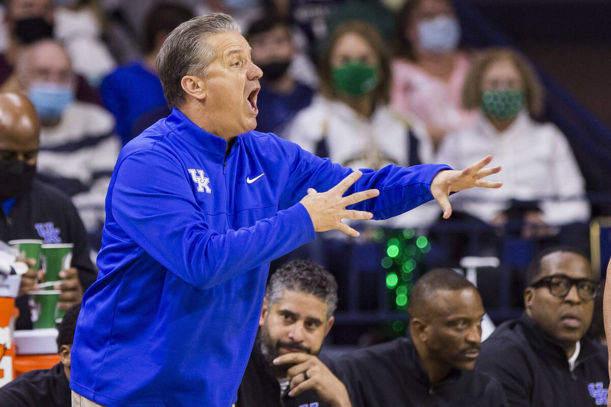 Kentucky head coach John Calipari yells to his players during an NCAA college basketball game a ...