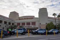 Las Vegas police investigate a shooting at Santa Fe Station on Thursday, Dec. 16, 2021, in Las ...