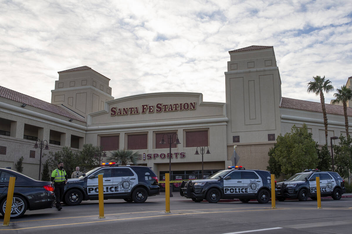 Las Vegas police investigate a shooting at Santa Fe Station on Thursday, Dec. 16, 2021, in Las ...