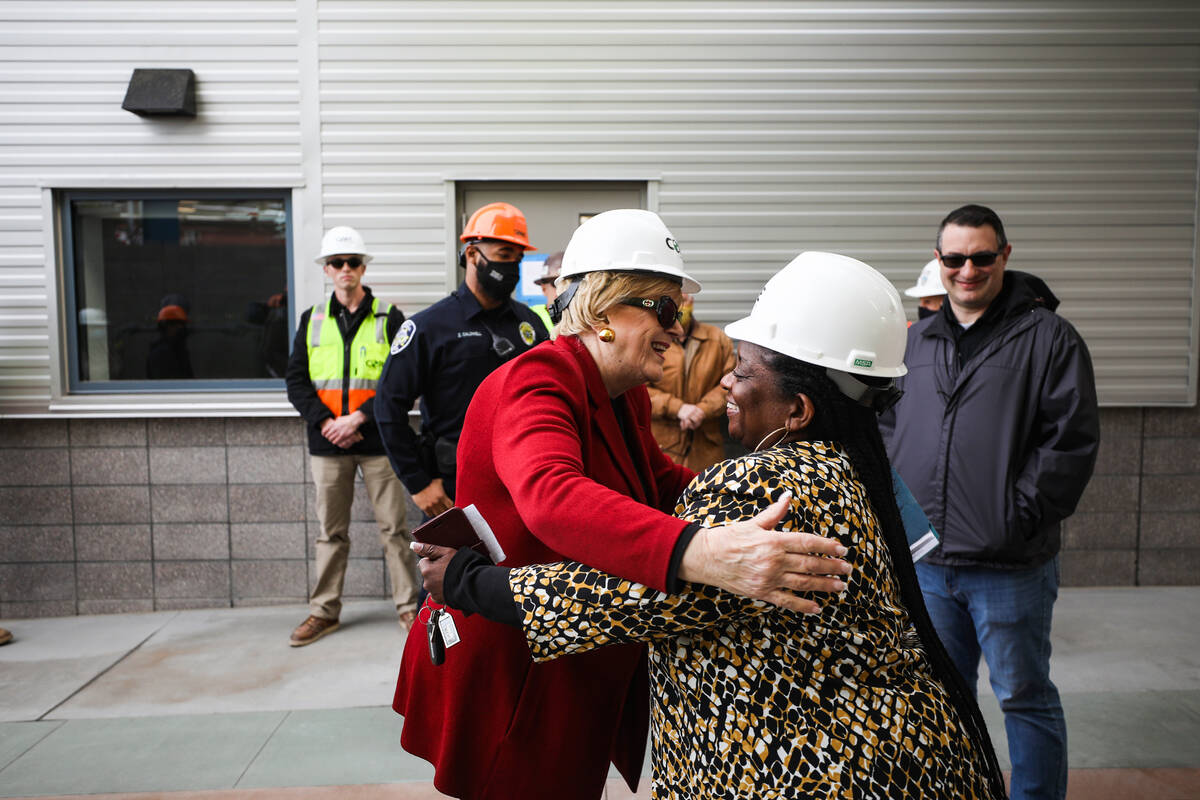 Las Vegas Mayor Carolyn Goodman, left, hugs Kathi Thomas, director of community services for th ...