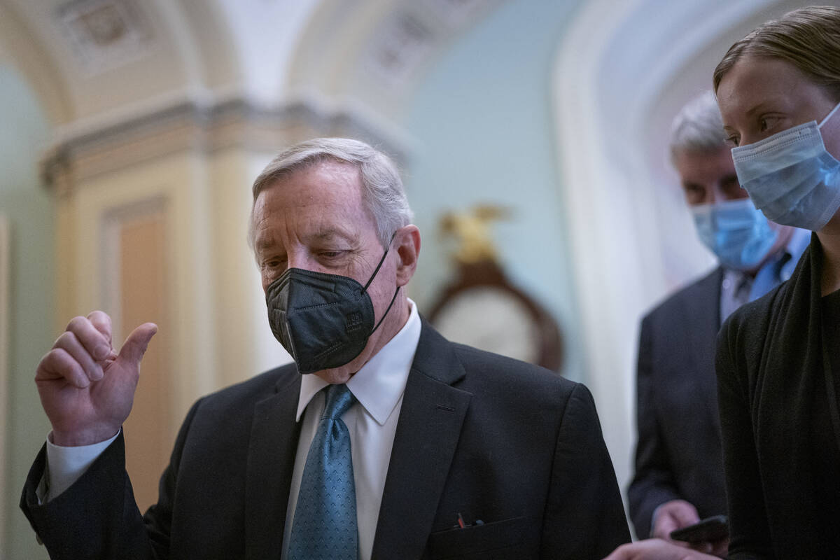 Senate Majority Whip Dick Durbin, D-Ill., returns to the chamber after a lengthy Democratic Cau ...