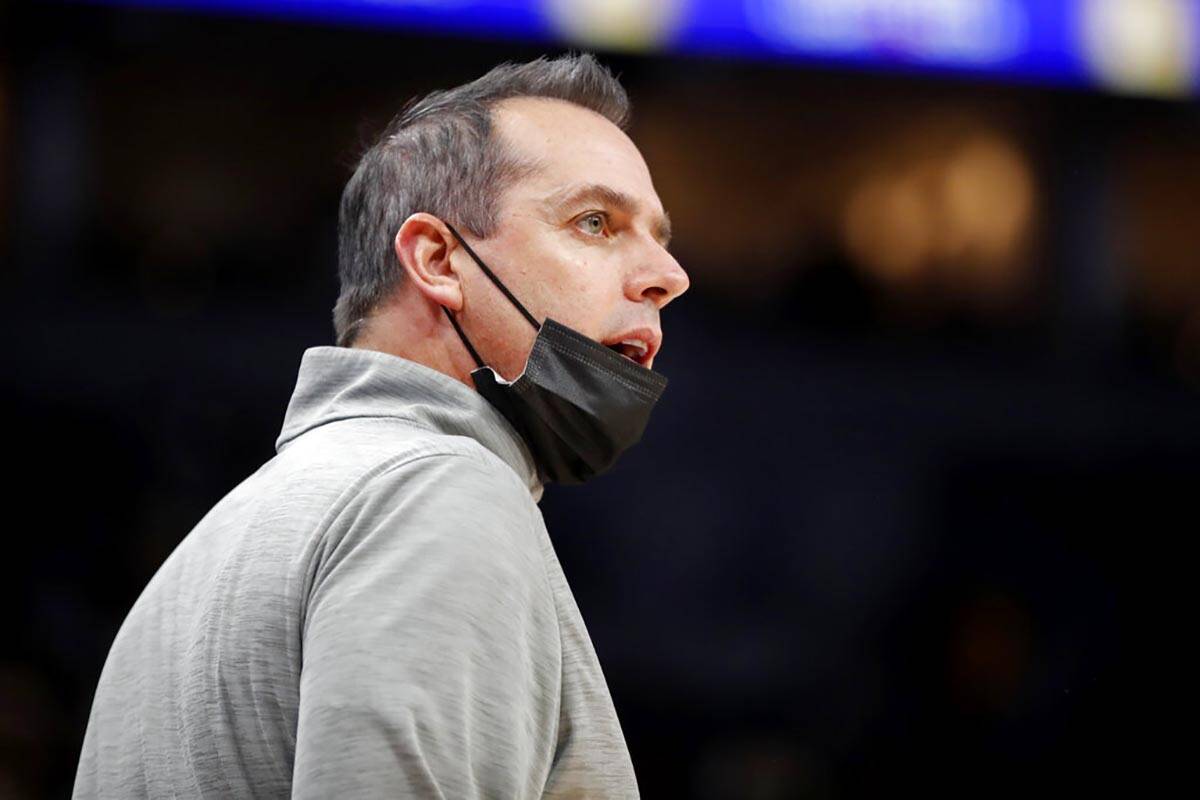 Los Angeles Lakers head coach Frank Vogel questions a referee in an NBA basketball game with th ...