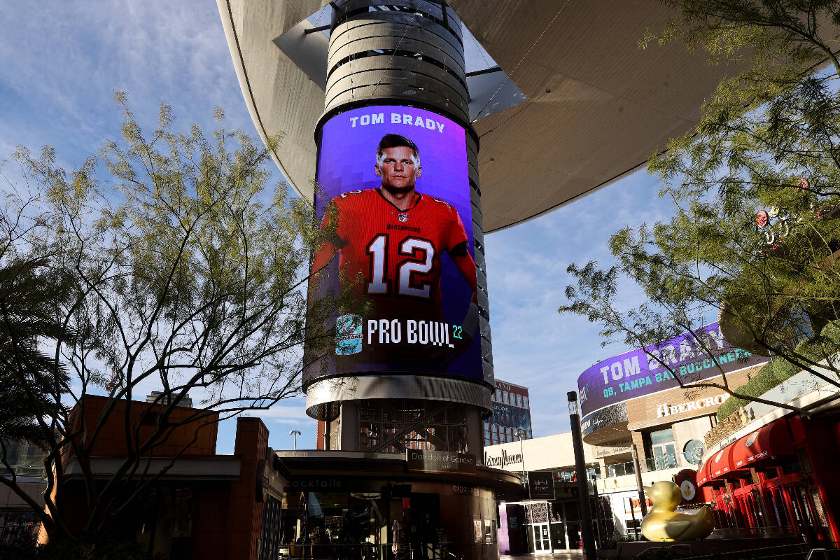Pro Bowl pick, Tampa Bay Buccaneers quarterback Tom Brady, is displayed on video screens at the ...