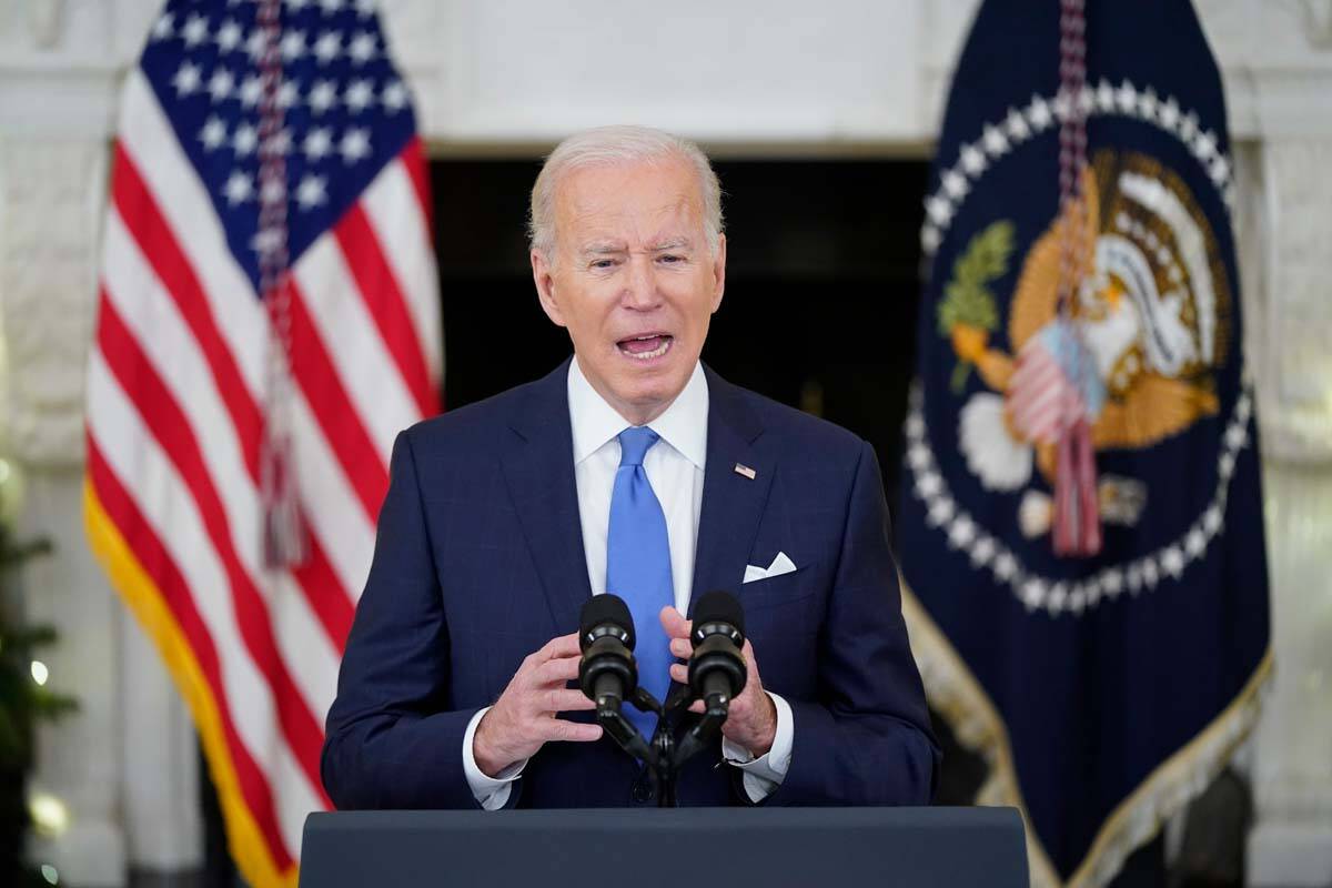 President Joe Biden speaks about the COVID-19 response and vaccinations, Tuesday, Dec. 21, 2021 ...