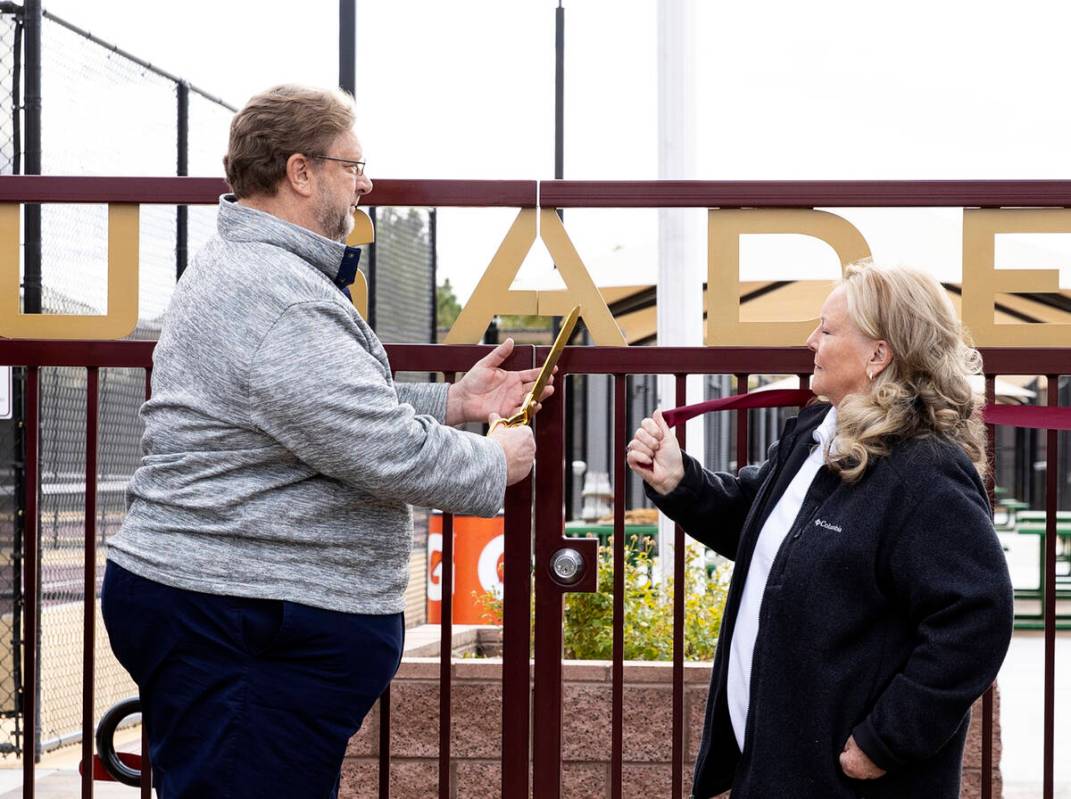 Jon Linker, left, chairman of the board of directors from Faith Lutheran High School, and Vice ...