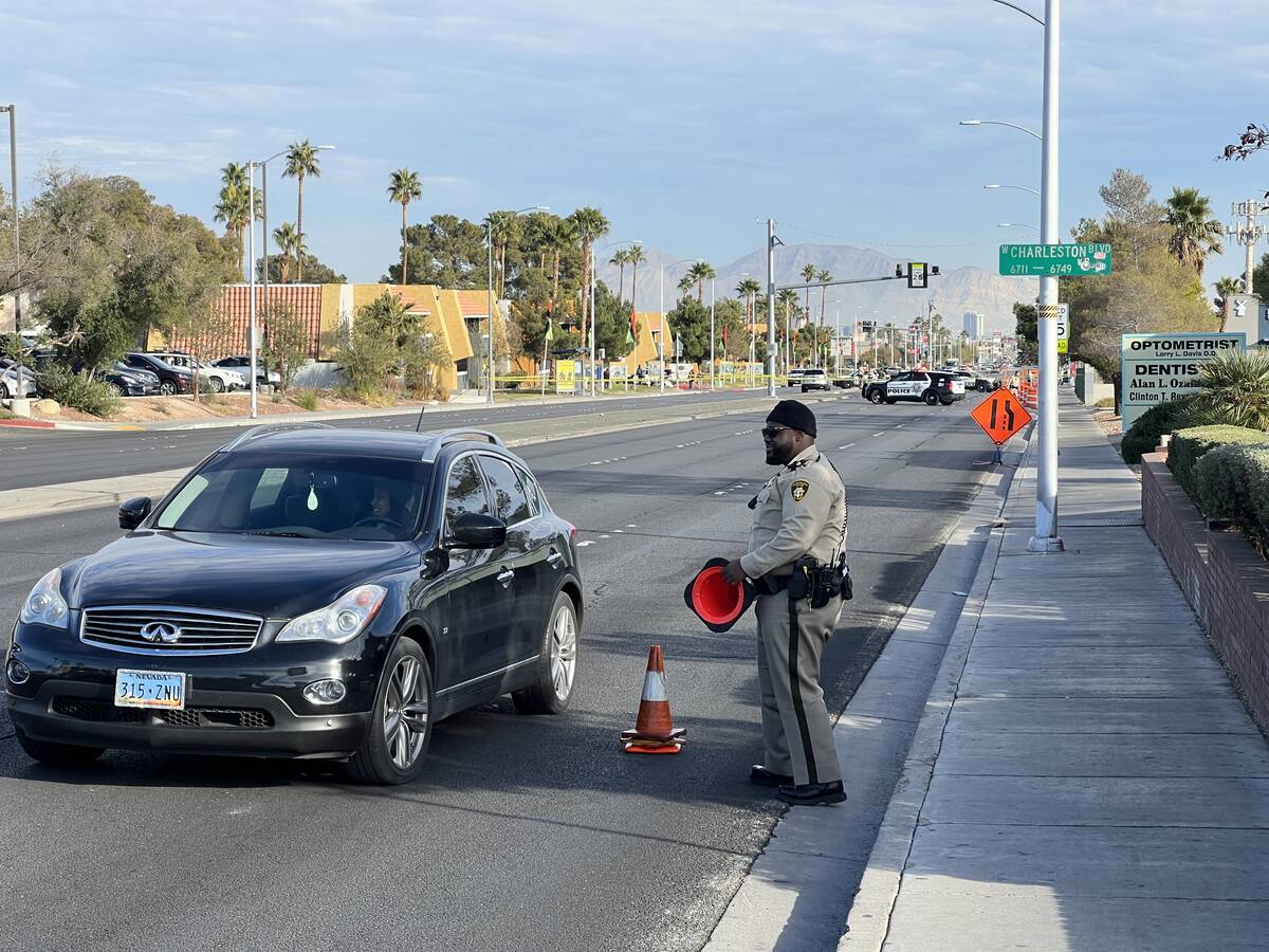 A Las Vegas police officer was injured Tuesday afternoon by a hit-and-run motorist at the inter ...