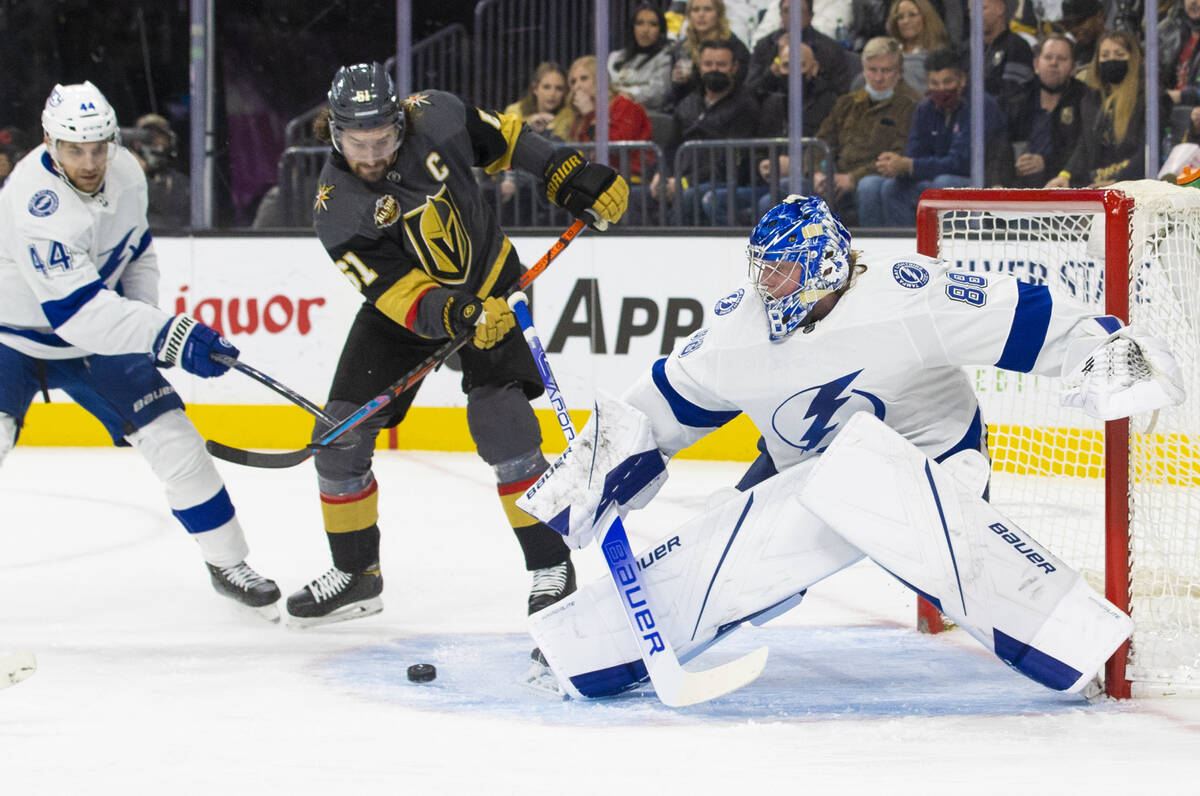 Vegas Golden Knights right wing Mark Stone (61) scores on Tampa Bay Lightning goaltender Andrei ...