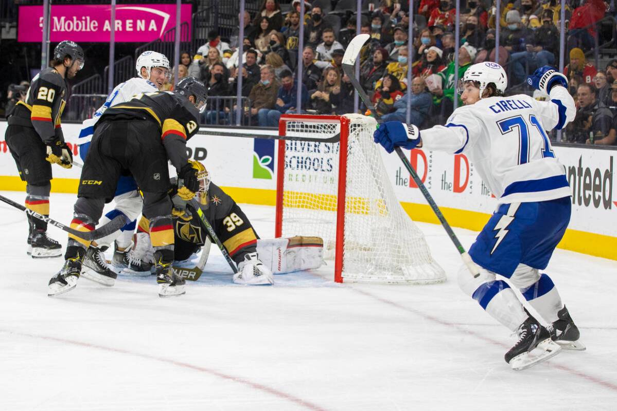 Tampa Bay Lightning center Anthony Cirelli (71) scores on Vegas Golden Knights goaltender Laure ...