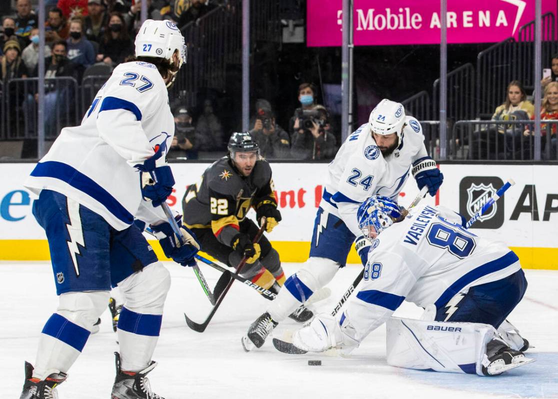 Vegas Golden Knights center Michael Amadio (22) shoots on Tampa Bay Lightning goaltender Andrei ...