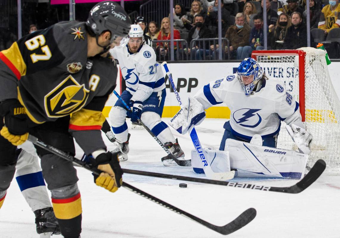 Vegas Golden Knights left wing Max Pacioretty (67) shoots on Tampa Bay Lightning goaltender And ...