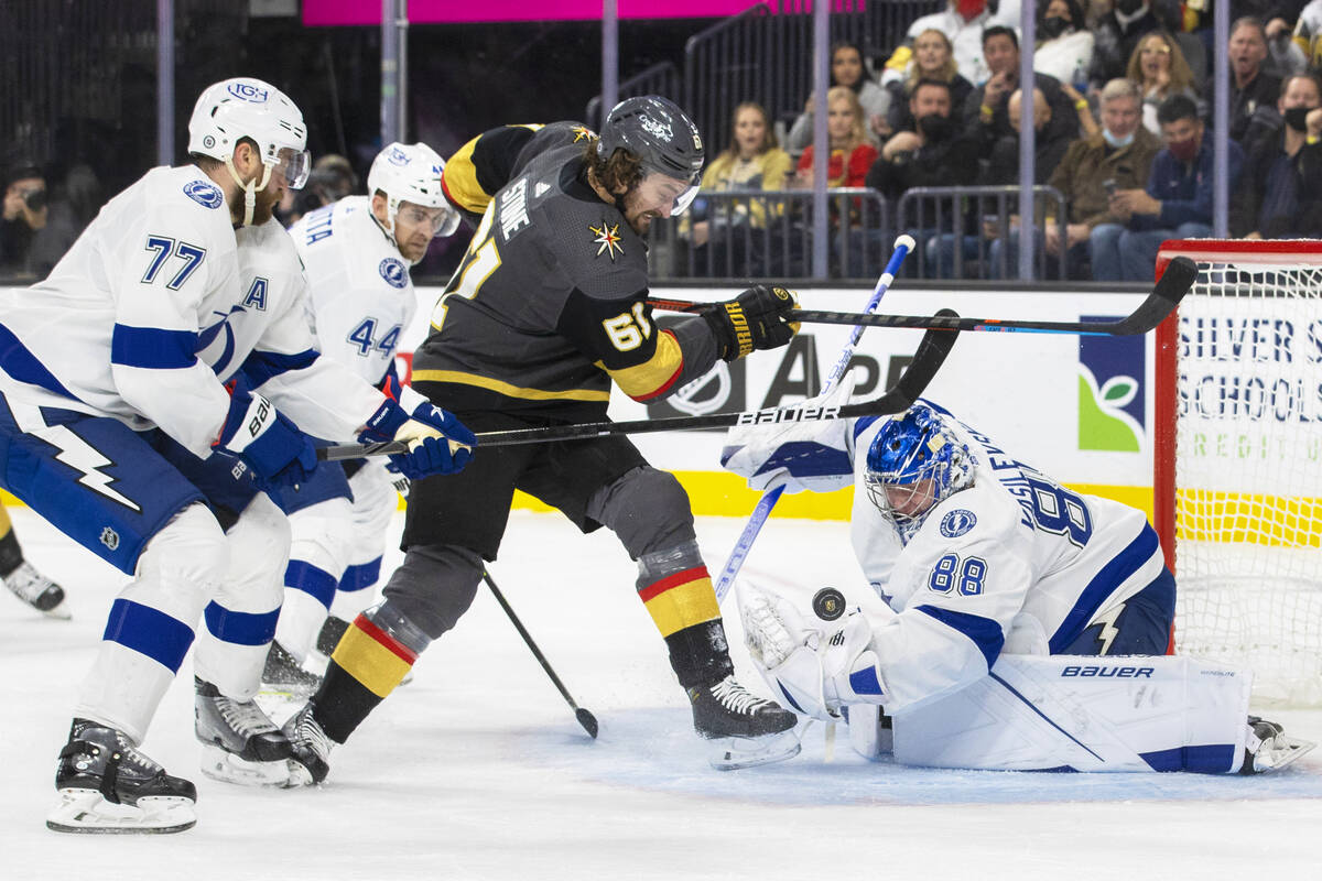 Vegas Golden Knights right wing Mark Stone (61) shoots on Tampa Bay Lightning goaltender Andrei ...