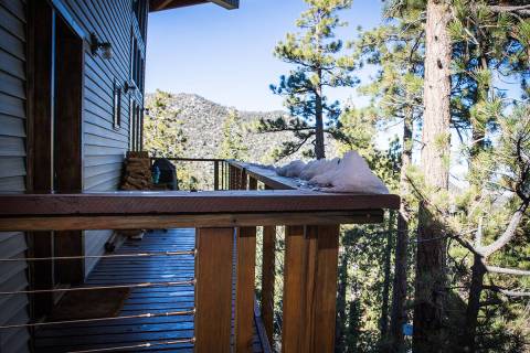 The 3,349-square-foot, three-level home off-grid cabin has a 8,245-foot elevation, and is near ...