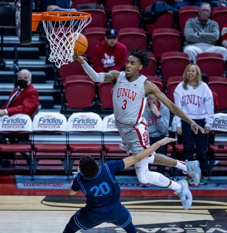 UNLV Rebels forward Donovan Williams (3) catches some air as he goes up for a shot over San Die ...