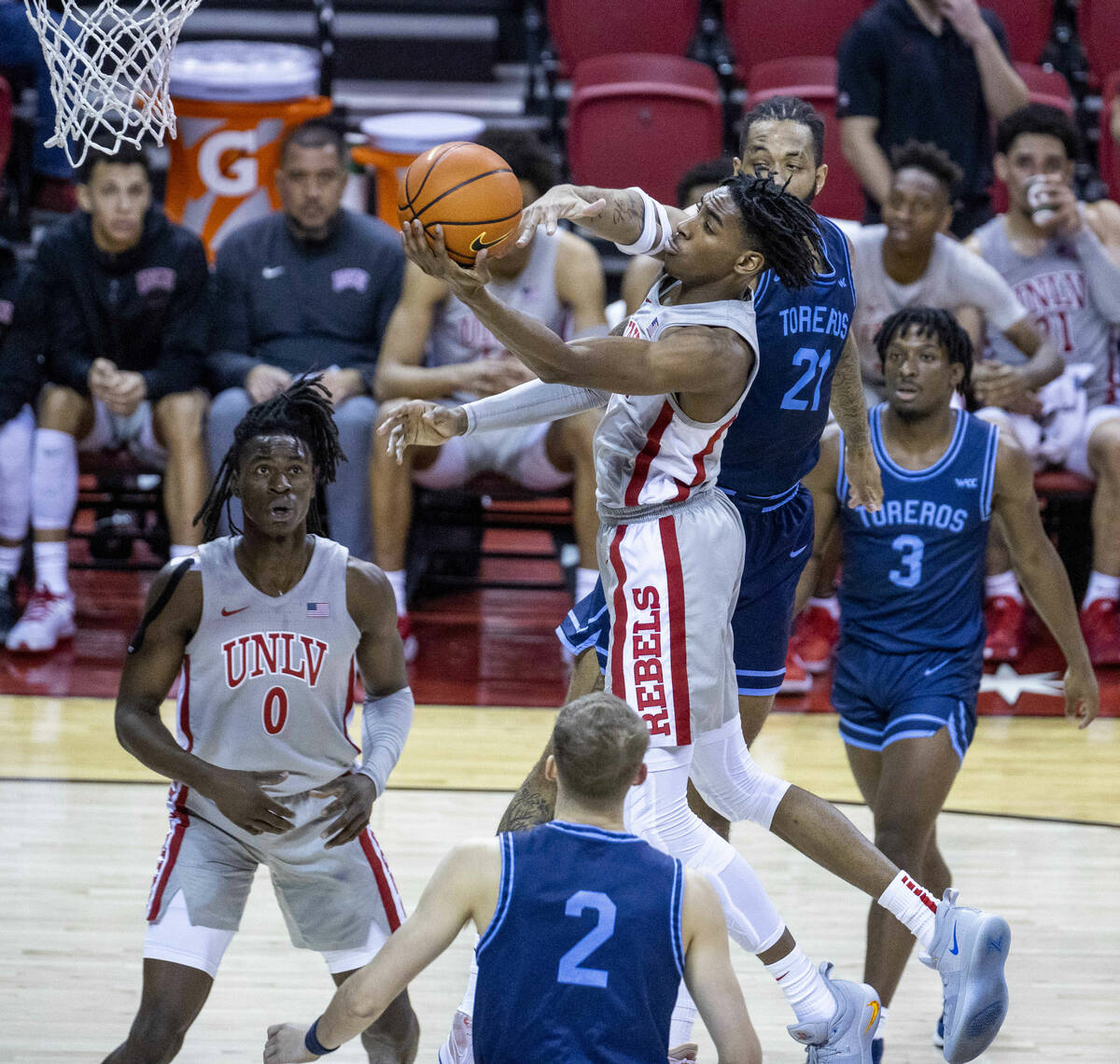 UNLV Rebels forward Donovan Williams (3) elevates to the basket for a shot past San Diego Torer ...