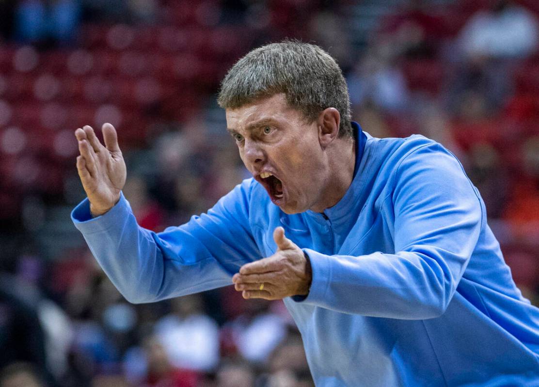 San Diego Toreros head coach Sam Scholl attempts to motivate his players versus the UNLV Rebels ...