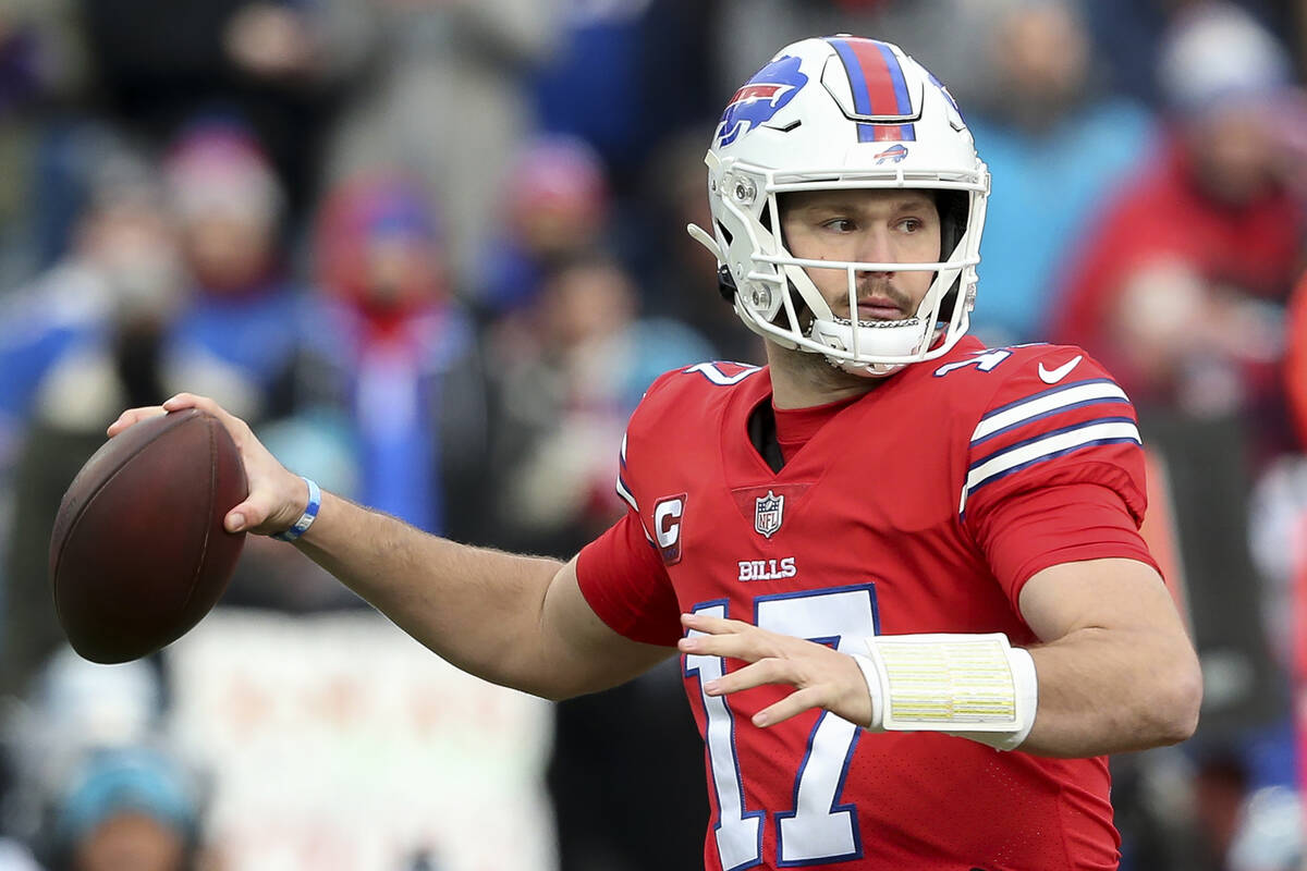 Buffalo Bills quarterback Josh Allen passes in the first half of an NFL football game against t ...