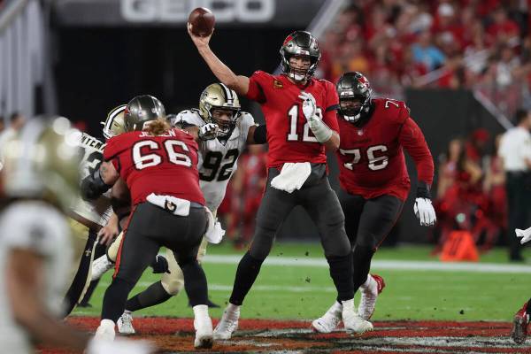 Tampa Bay Buccaneers quarterback Tom Brady (12) throws a pass against the New Orleans Saints du ...