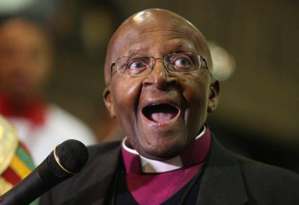 FILE - Anglican Archbishop Emeritus Desmond Tutu takes part in a Mass to celebrate four decades ...