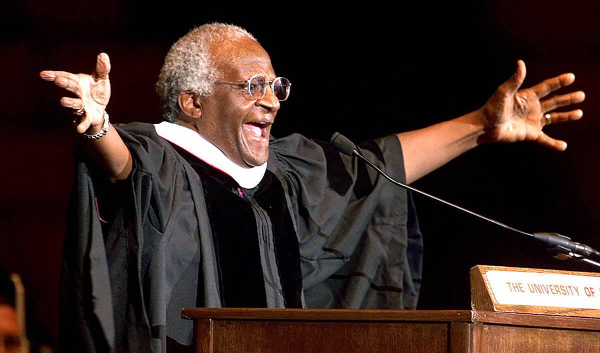 FILE - Archbishop Emeritus Desmond Tutu addresses new University of Oklahoma graduates, at a ce ...
