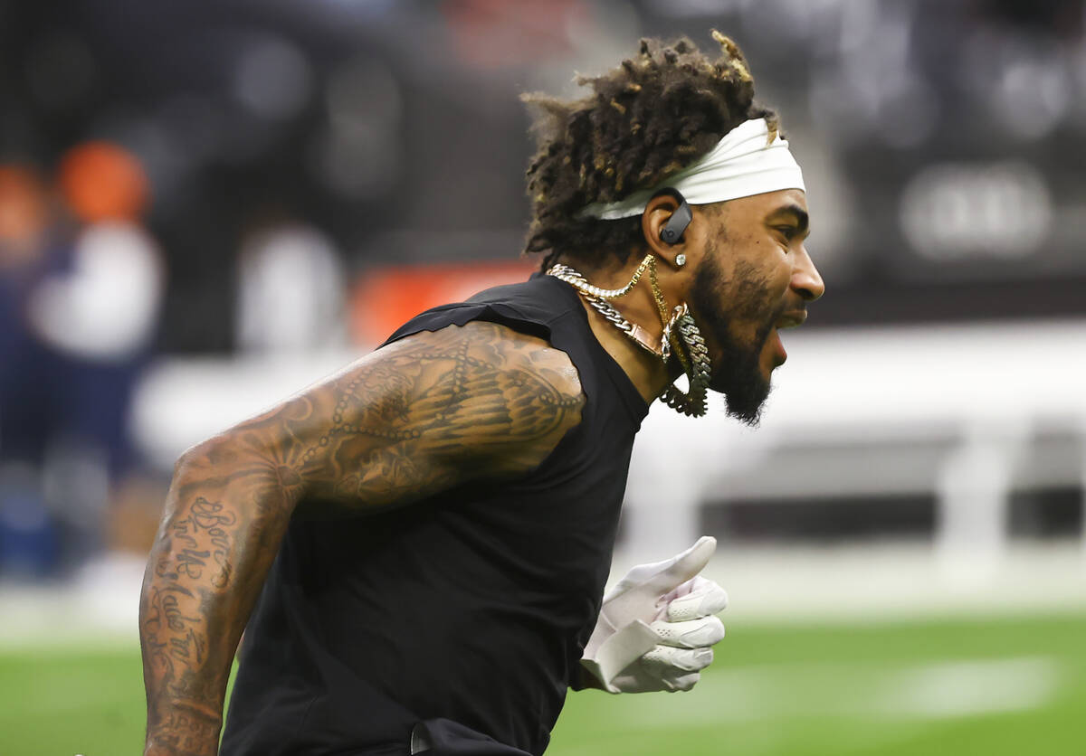Raiders wide receiver DeSean Jackson warms up before an NFL football game against the Denver Br ...