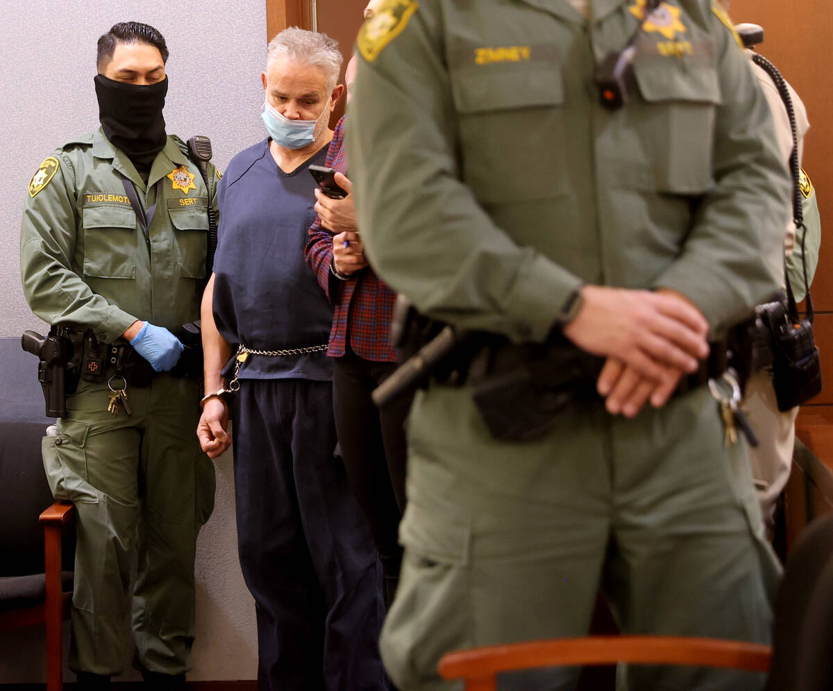 Eric Holland appears in court at the Regional Justice Center in Las Vegas Tuesday, Dec. 28, 202 ...